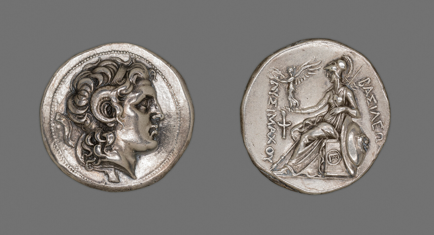Silver tetradrachm, 297-281 BC: Alexander the Great in profile with the ram's horn of the Egyptian god Ammon curling around his ear — the two-horned iconography behind the epithet Dhul Qarnayn.